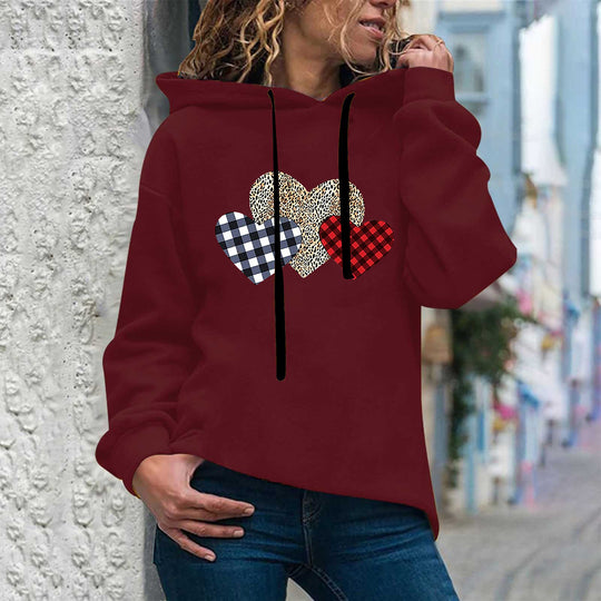 Damen nan lässiger Oversize Kapuzenpullover mit Herz‑und‑Pfotenprint, Kordelzug und gerippten Bündchen Shop Nory