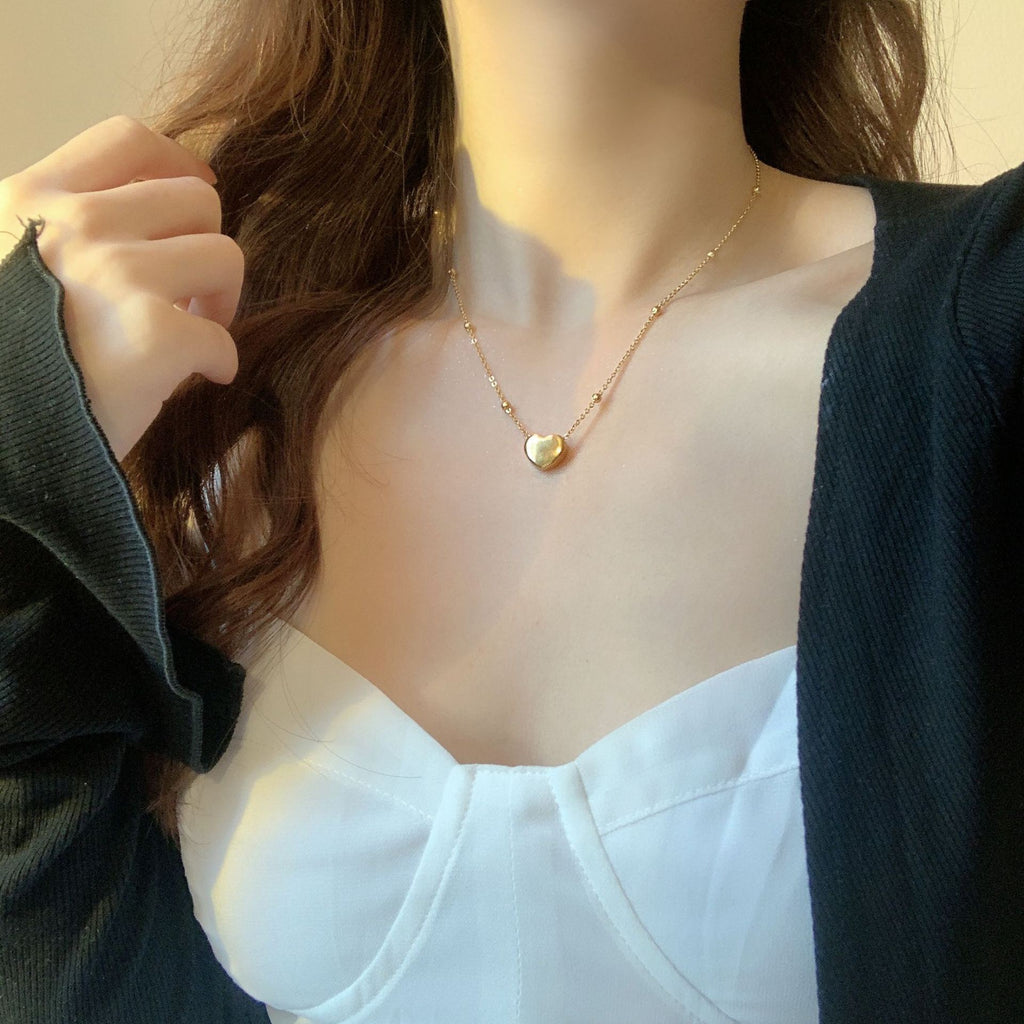 Damen Halskette mit herzförmigem Anhänger und zarten Details Shop Nory