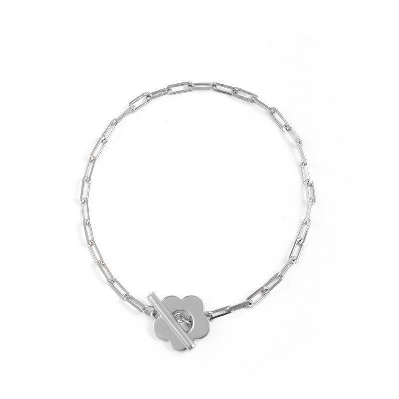 Damen Armband mit floralen Motiven und funkelnden Zirkonia-Elementen Shop Nory