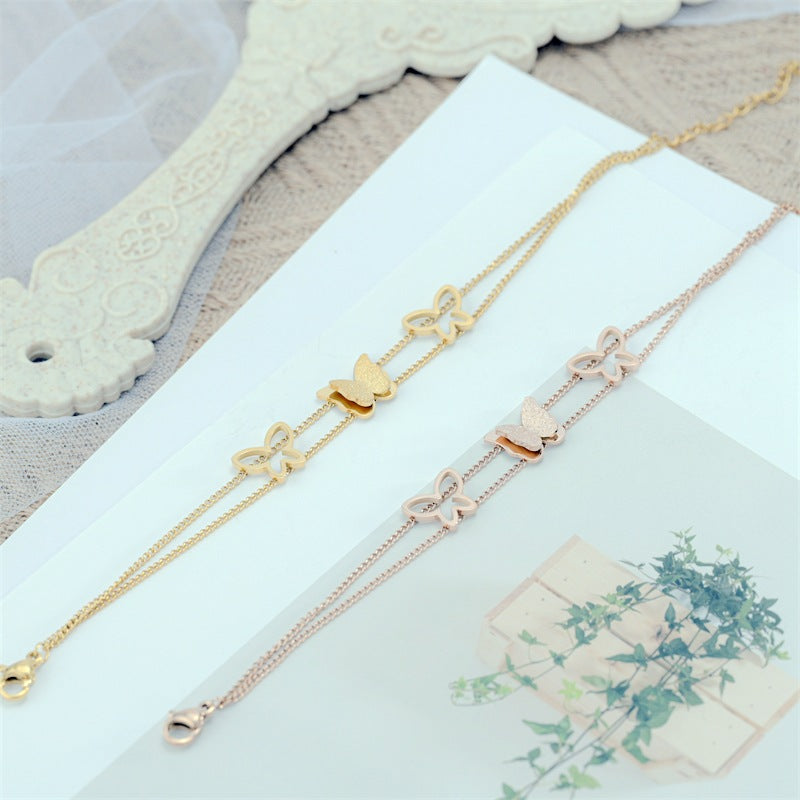 Damen Armreif mit filigranem Schmetterlingsdesign aus hochwertigem Edelstahl Shop Nory