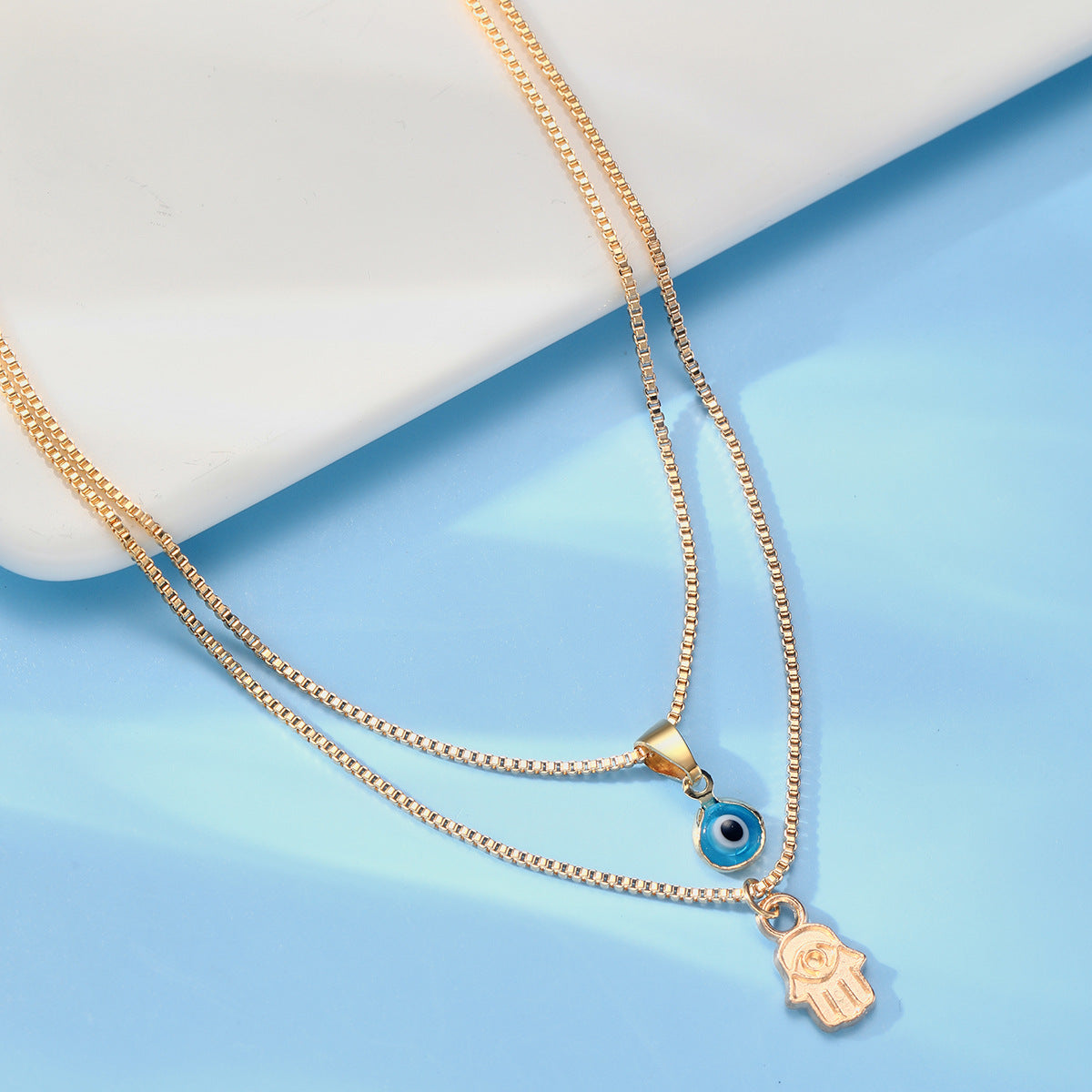 Damen Halskette Set mit schützendem Auge und Handanhänger Shop Nory