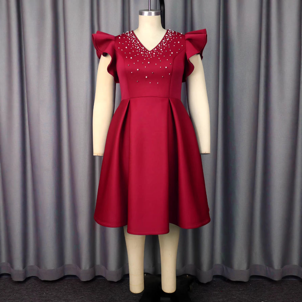Damen A-Linien Kleid mit glitzernden Perlen und voluminösen Ärmeln