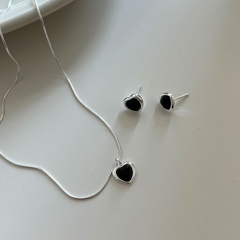 Damen Halskette mit herzförmigem Anhänger aus schwarzem Onyx und feinem Silber Shop Nory