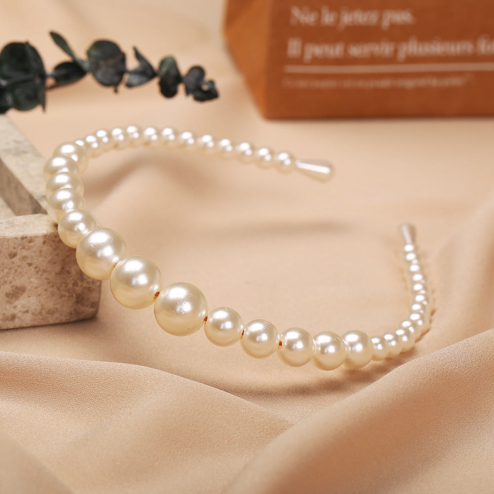 Damen Haarband mit eleganten Perlenverzierungen Shop Nory