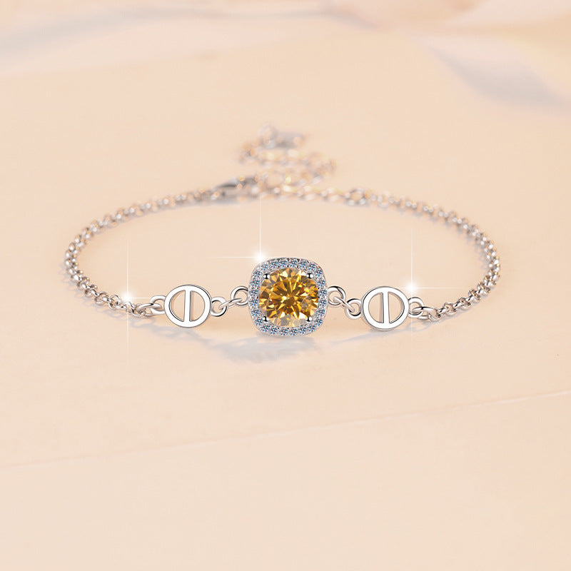 Damenarmband mit strahlend gelbem Kristall und funkelndem Zirkonia-Rahmen Shop Nory