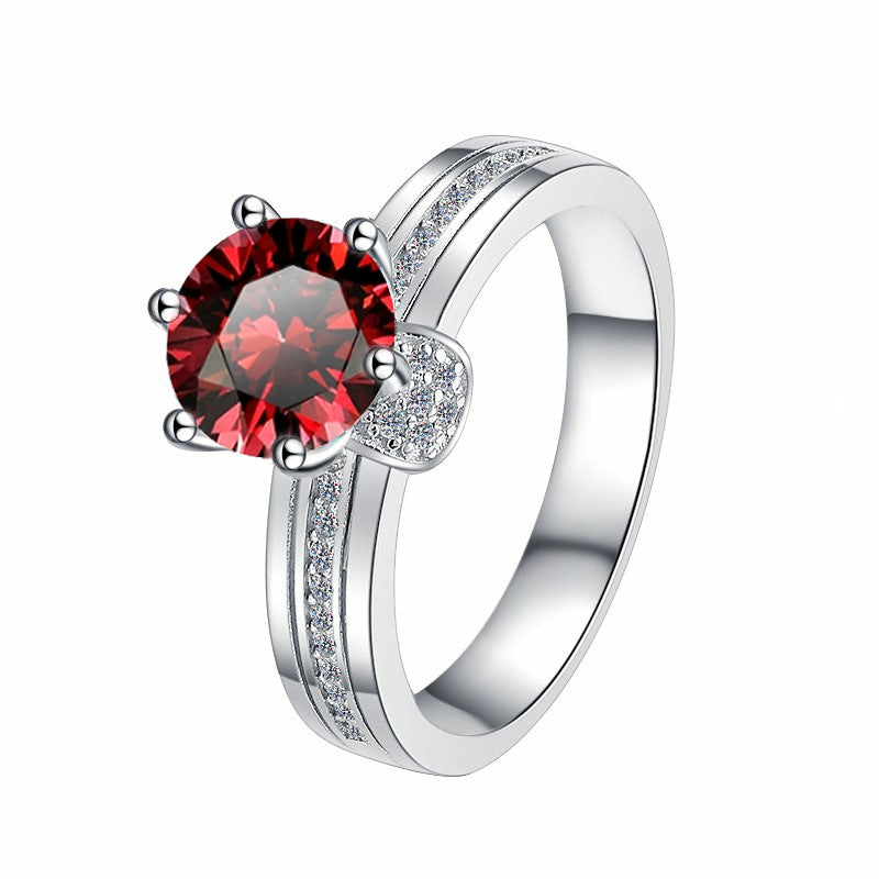 Damenring mit funkelndem schwarzen Zirkonia und eleganter Detailverzierung Shop Nory