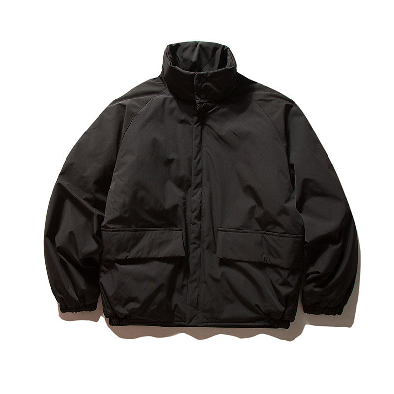 Unisex Boxy Wattierte Übergangsjacke mit hohem Stehkragen, elastischen Bündchen und aufgesetzten Klappentaschen Shop Nory
