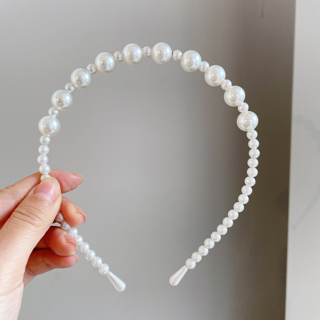 Damen Haarband mit eleganten Perlenakzenten Shop Nory