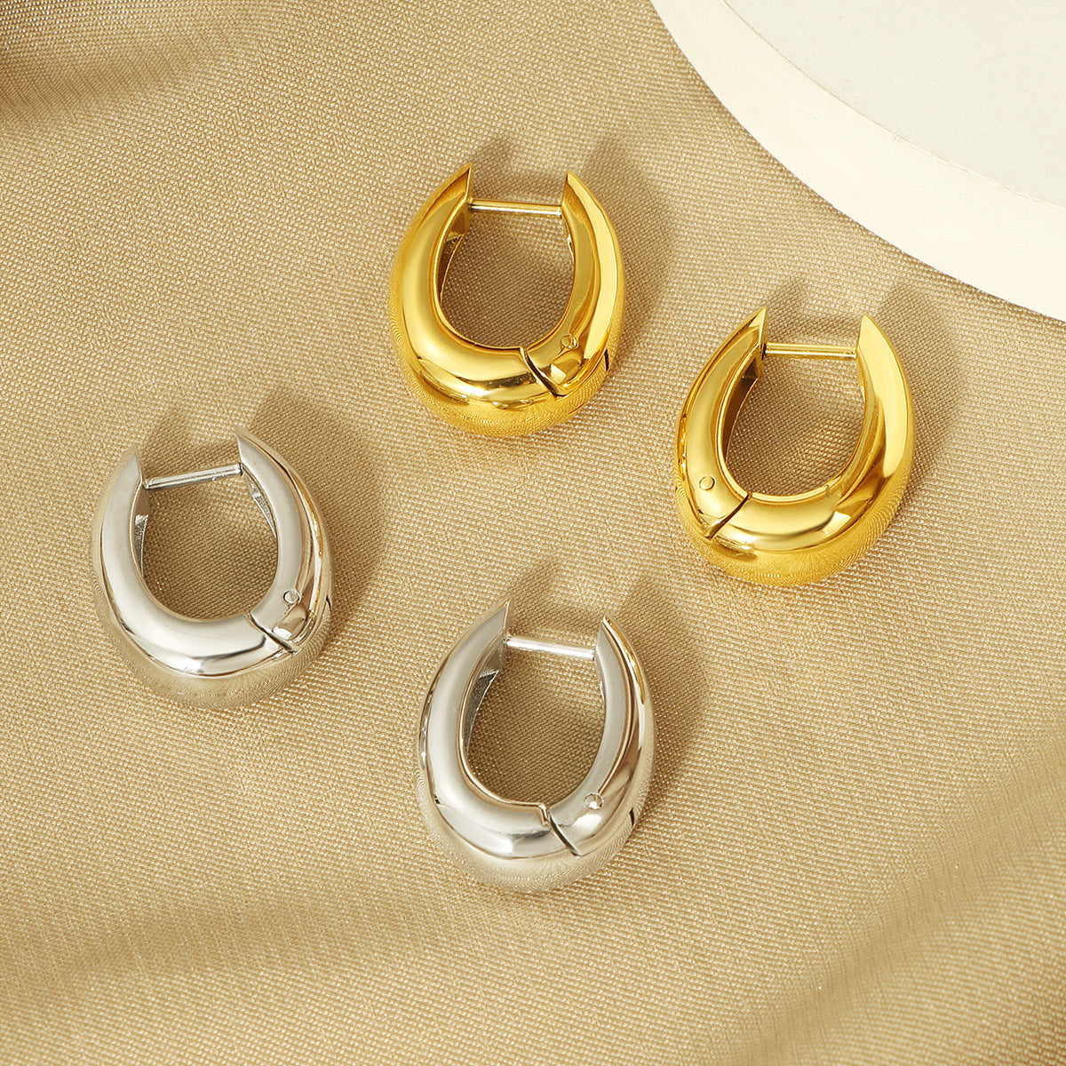 Damen Skulpturale Gold Creolen Shop Nory