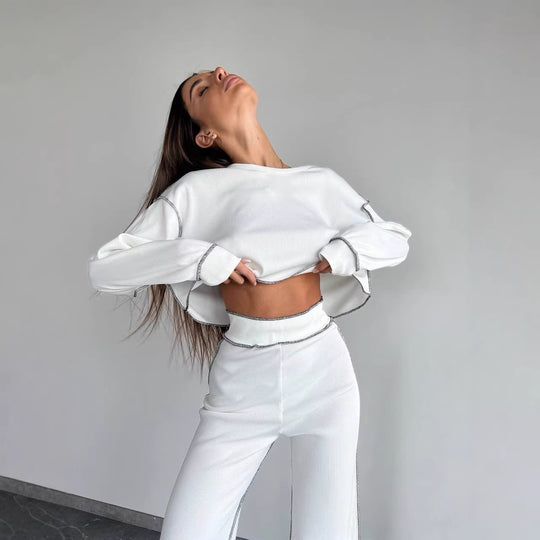 Damen Cropped Oversized-Sweatshirt mit Overlocknähten und High-Waist ausgestellter Hose Set Shop Nory