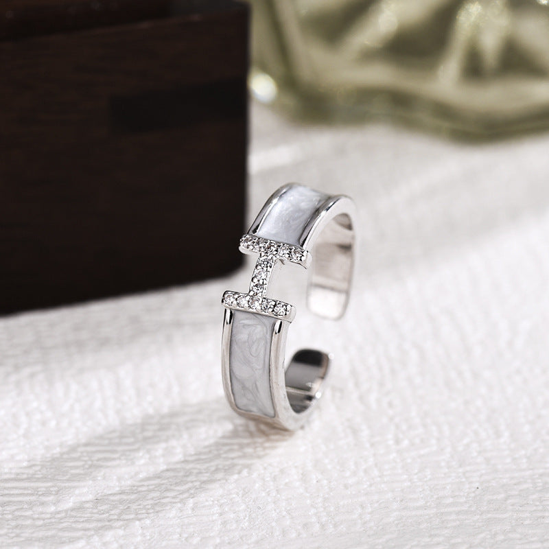 Damen Offener Ring mit kunstvollem Design und funkelnden Zirkonia Shop Nory