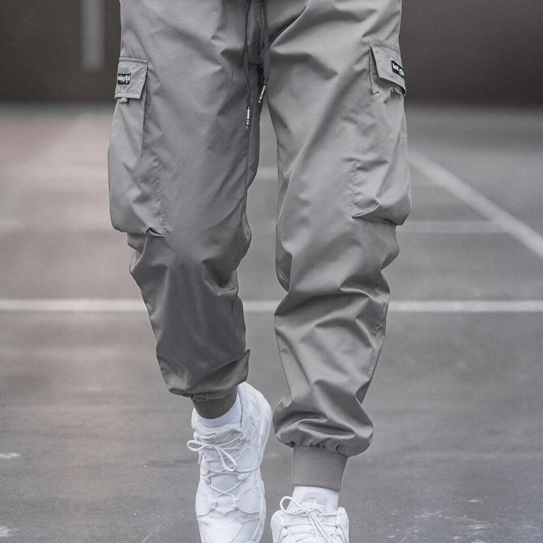 Herren Tapered Cargo-Joggerhose mit elastischem Tunnelzug, verstärkten Klappentaschen & gerippten Knöchelbündchen Shop Nory