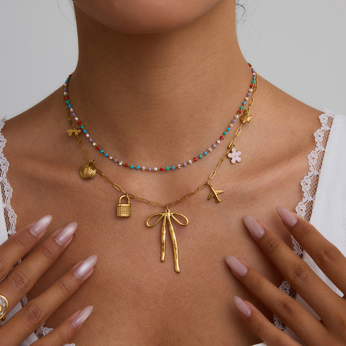 Damen Halskette mit verspieltem Charms-Design aus hypoallergenem Edelstahl Shop Nory