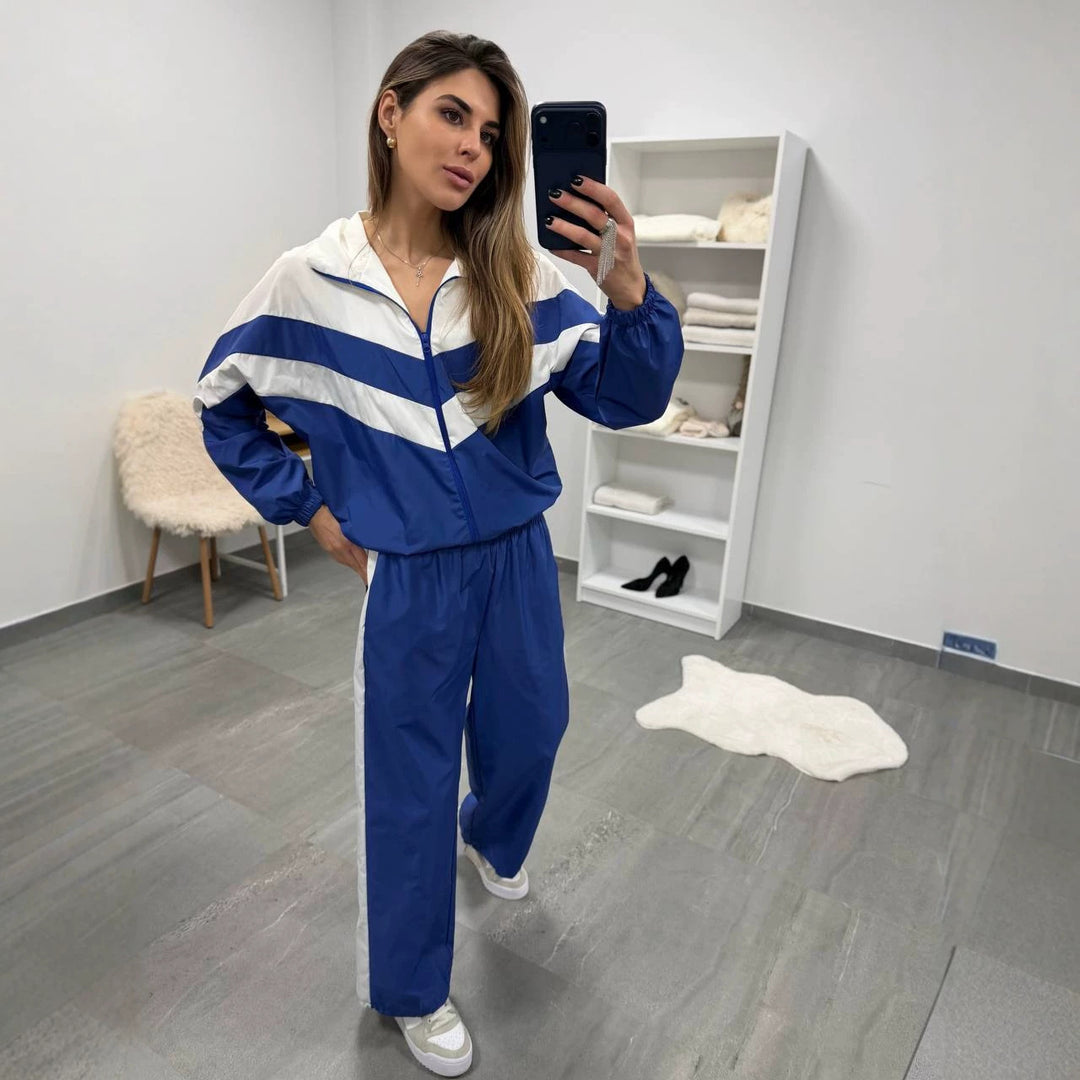 Damen retro Nylon-Trainingsanzug mit Kapuzen-Zipjacke und weiter hochgeschnittener Hose Shop Nory