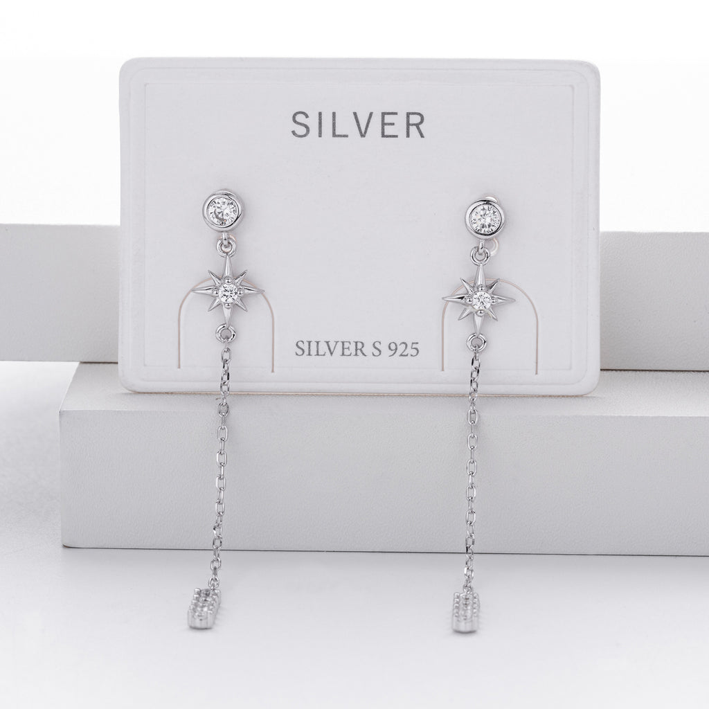 Damen goldene Ohrhänger mit funkelnden Zirkonen und eleganten Kettendetails Shop Nory