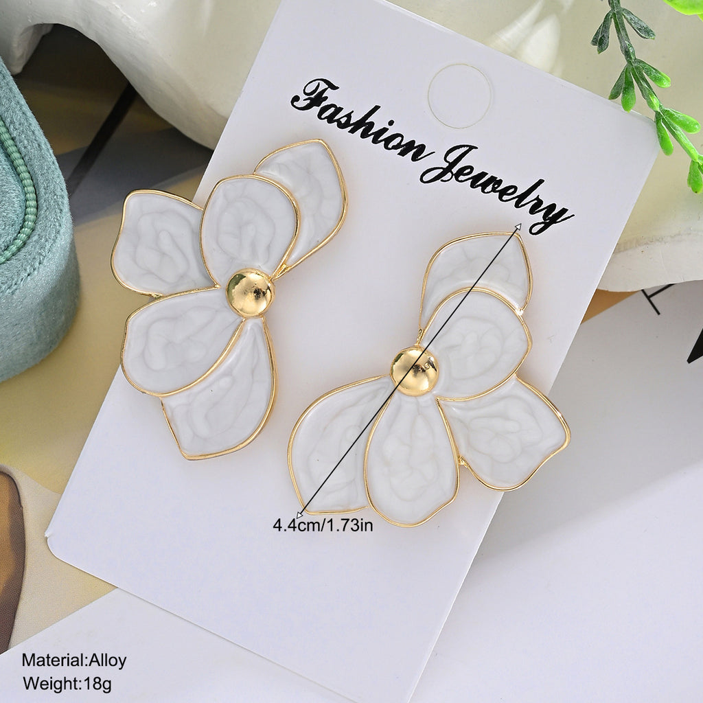 Damen Ohrringe im floralen Design mit elegantem Goldrand Shop Nory