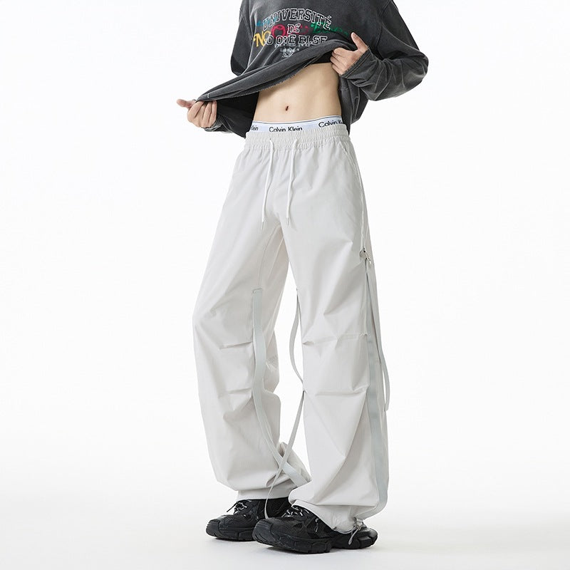 Damen Weite Tech-Cargo-Hose mit Tunnelzugbund, Beinriemen und wasserabweisender Nylon‑Optik Shop Nory