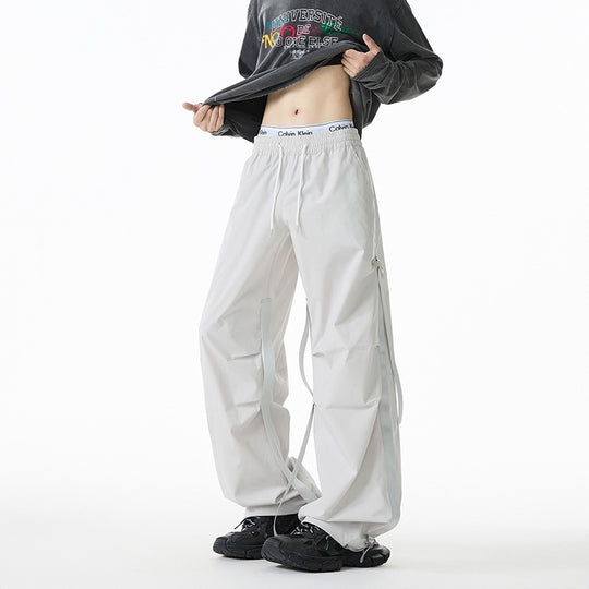 Damen Weite Tech-Cargo-Hose mit Tunnelzugbund, Beinriemen und wasserabweisender Nylon‑Optik Shop Nory