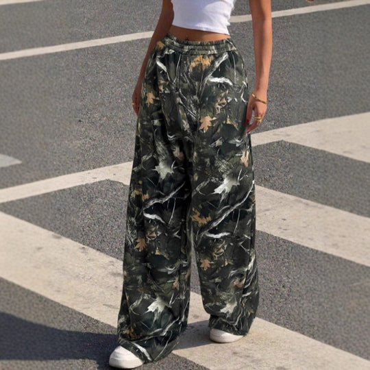 Damen nan weite Palazzo-Hose mit floralem Alloverprint und elastischem Bund Shop Nory
