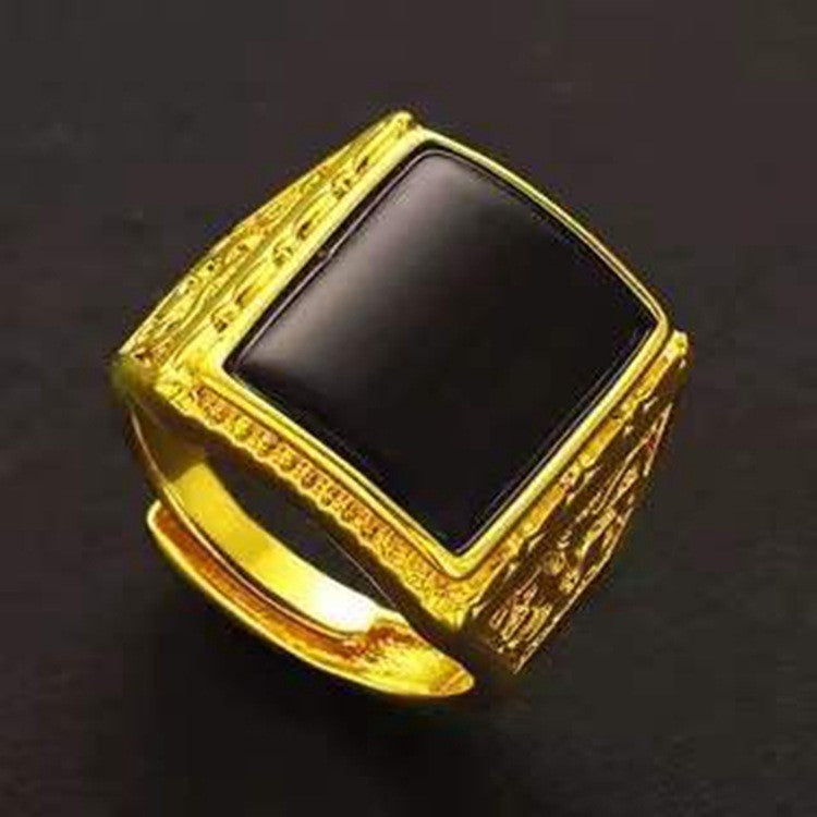 Herren Ring mit kunstvollem rotem Stein und eleganter goldfarbener Umrandung Shop Nory