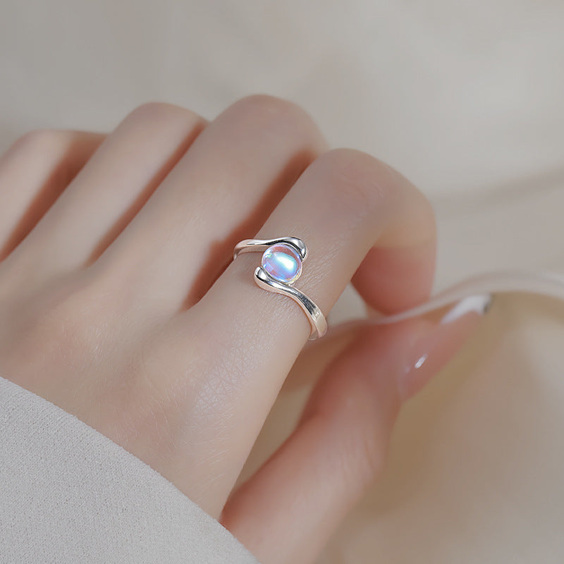 Damen Ring mit elegantem, geschwungenem Design und funkelndem Glasstein Shop Nory