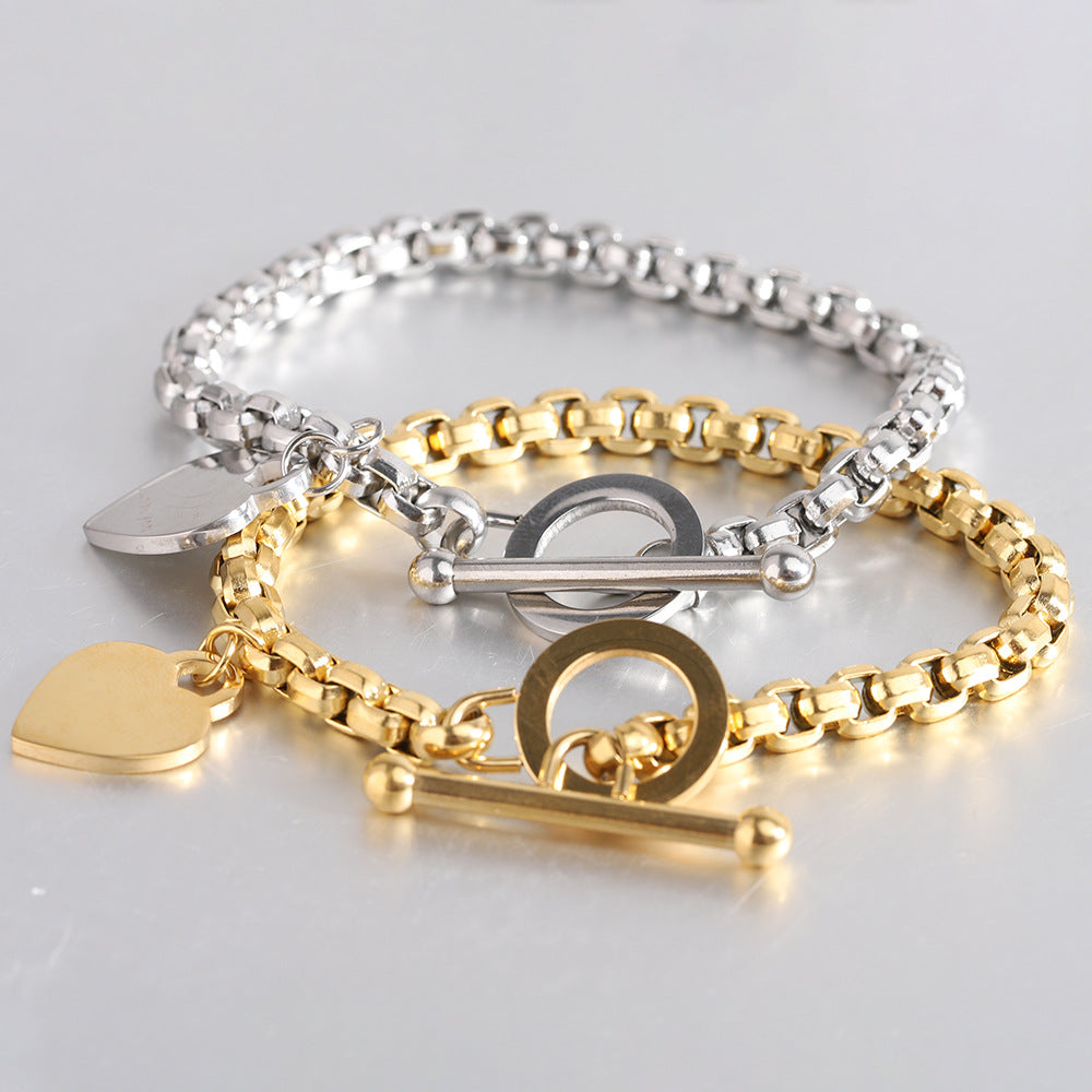 Damen Armband mit herzförmigem Anhänger und doppeltem Edelstahl-Design Shop Nory