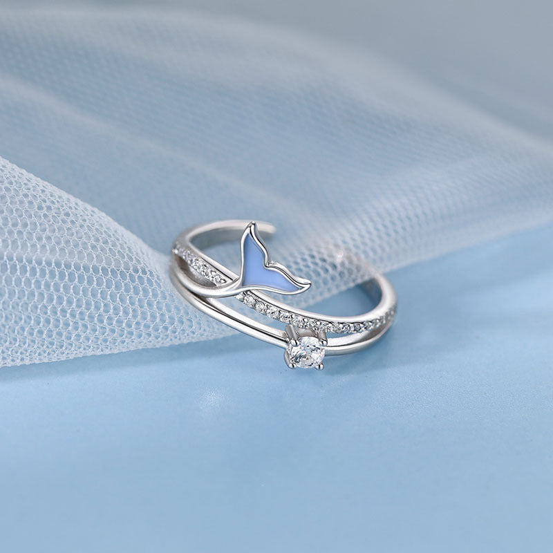 Damenring mit stilvollem Wellen-Design und funkelnden Akzenten Shop Nory