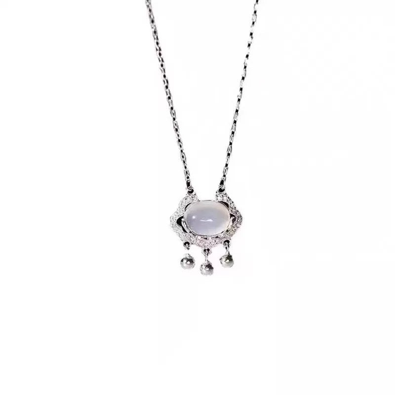 Damen Halskette mit elegantem Roséquarz-Anhänger und filigranen Details Shop Nory