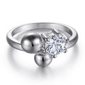 Damen Ring mit funkelndem Solitär und modernen Kugeldetails Shop Nory