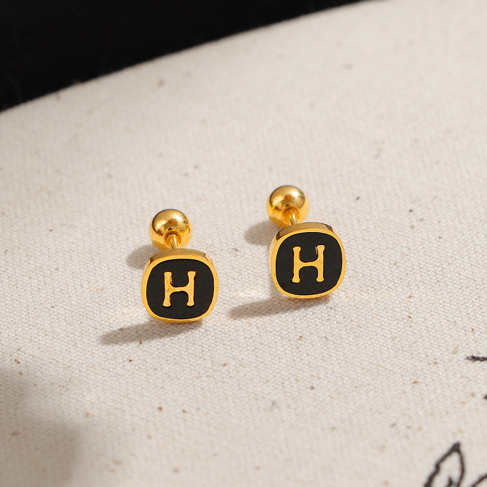 Damen elegante Ohrstecker mit stilvollem Logo-Design Shop Nory