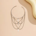 Damen mehrlagige Choker-Halskette mit modernen Metallanhängern Shop Nory