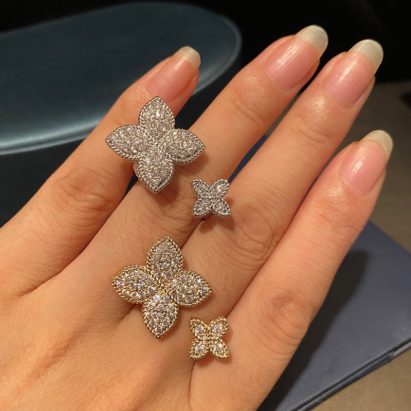 Damenring mit floralem Design und funkelnden Zirkonia-Steinen Shop Nory
