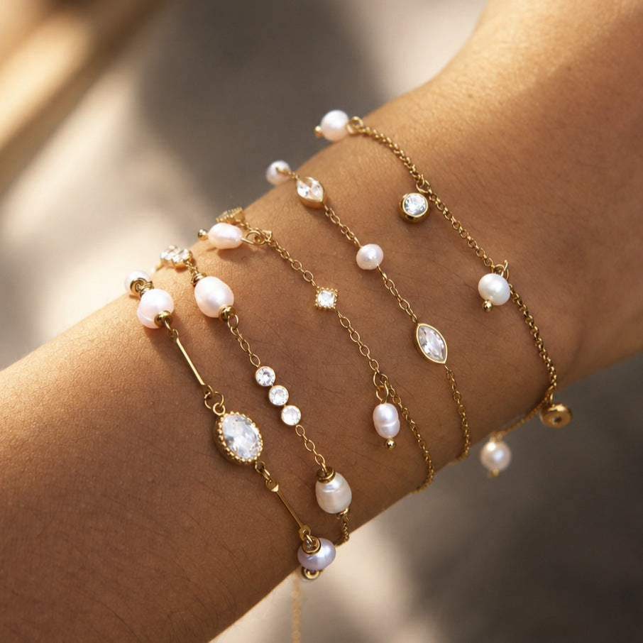 Damen Armband mit glänzenden Zirkonia und eleganten Perlendetails Shop Nory
