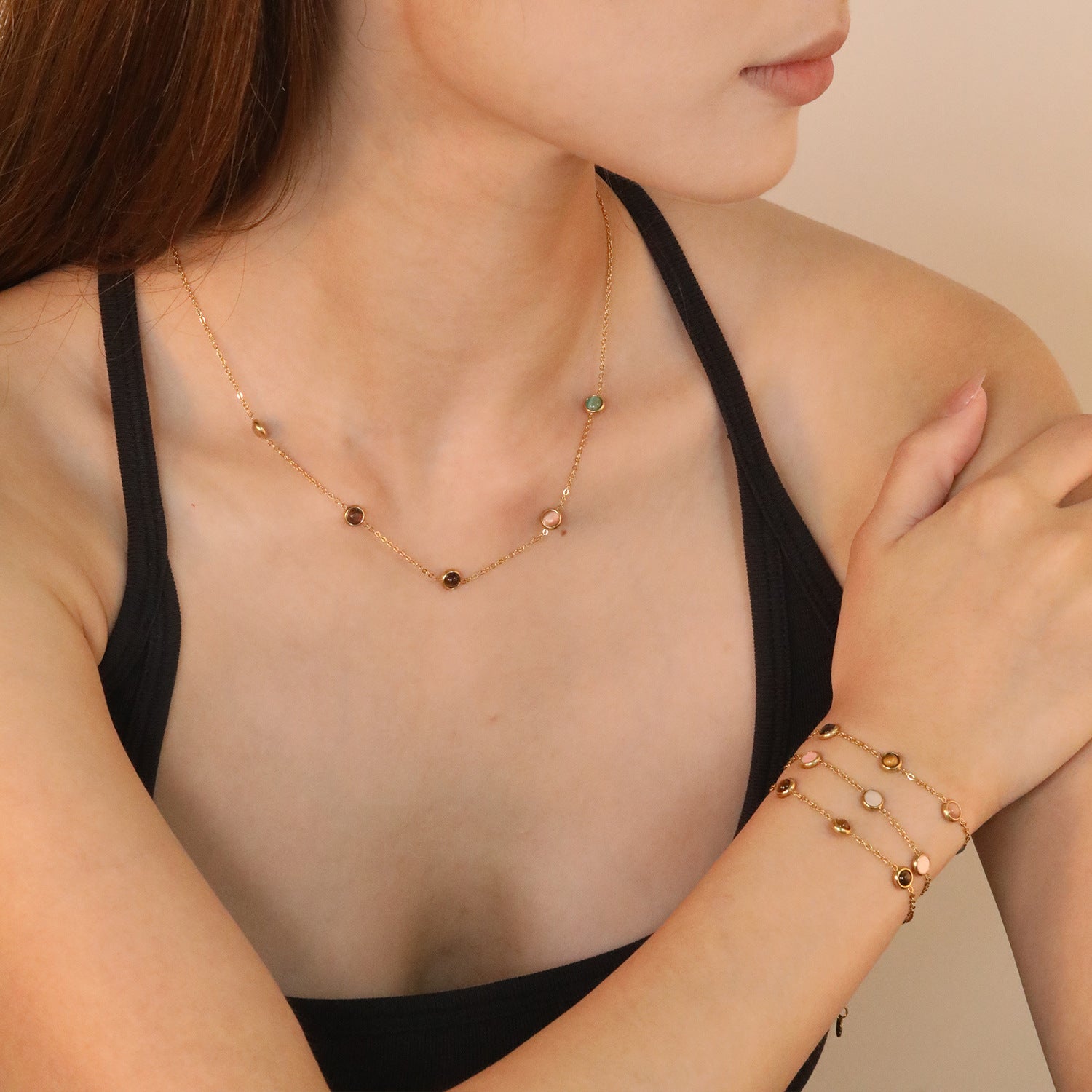 Damen Armband mit eleganten, eingefassten Edelsteinen Shop Nory