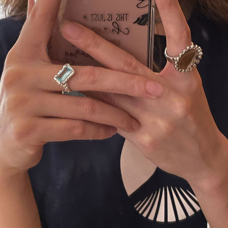 Damenring mit einzigartigem Design und facettiertem Edelstein Shop Nory