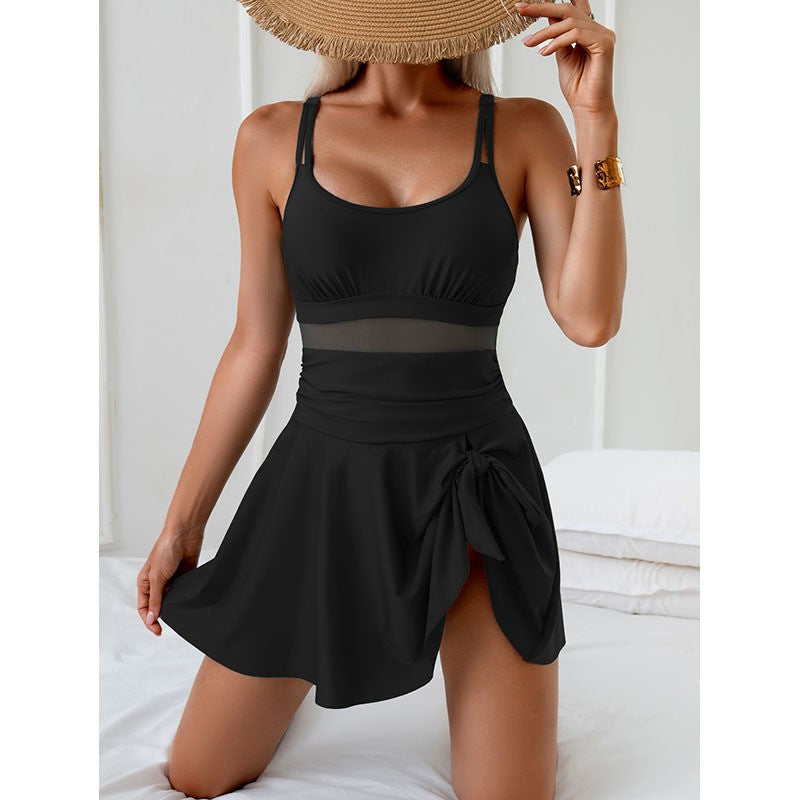 Damen eleganter einteiliger Badeanzug mit durchsichtigen Einsätzen und seitlichem Rock