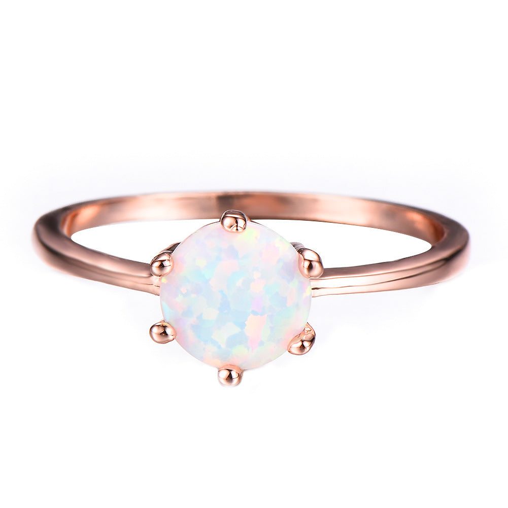 Damen Ring mit schimmerndem Opalstein in eleganter Fassung Shop Nory