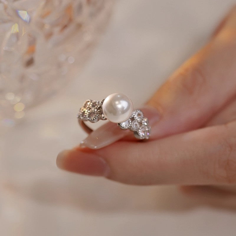 Damen eleganter Ring mit funkelnden Kristallen und Perle Shop Nory