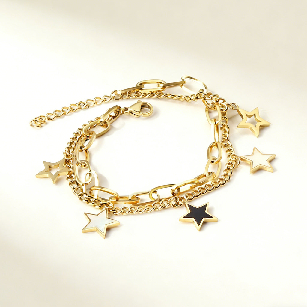 Damen Armband aus rosévergoldetem Edelstahl mit funkelnden Anhängern Shop Nory