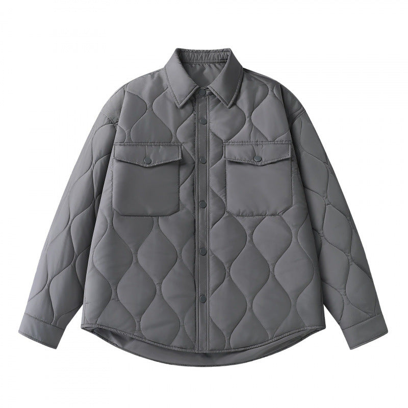 Unisex Gepolsterte gesteppte Hemdjacke mit Pattentaschen und abgerundetem Saum Shop Nory