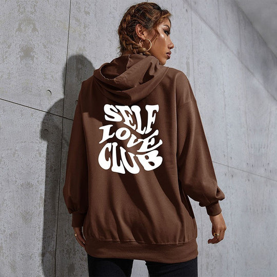 Damen Lässiger Oversize-Kapuzenpullover mit Statement-Print, Kängurutasche und Rippbündchen Shop Nory