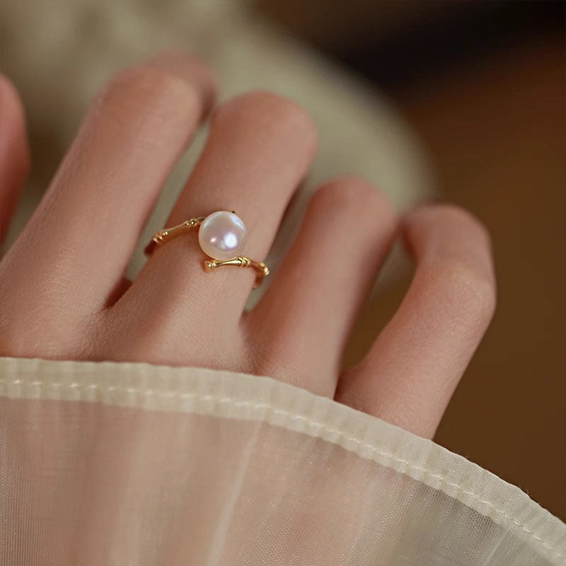 Damen Zierlicher Ring mit hochwertiger Perle und kunstvoller Fassung Shop Nory