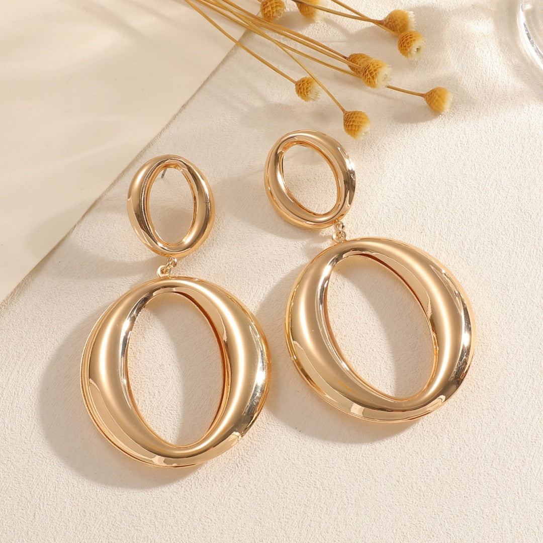 Damen Ohrringe mit modernem, skulpturalem Design Shop Nory