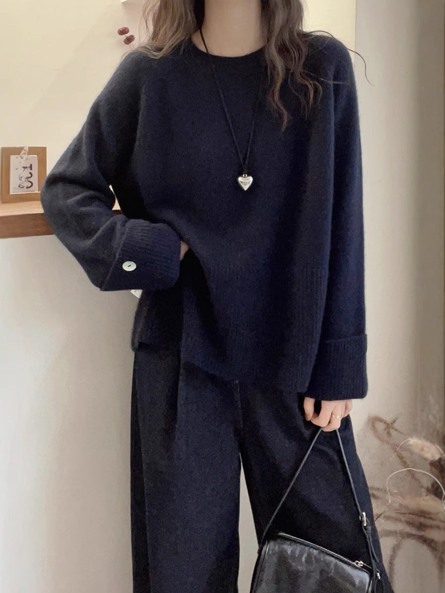 Damen Oversize‑Feinstrickpullover mit breitem Rippbund, extraweiten Ärmelabschlüssen und Zierknopf Shop Nory