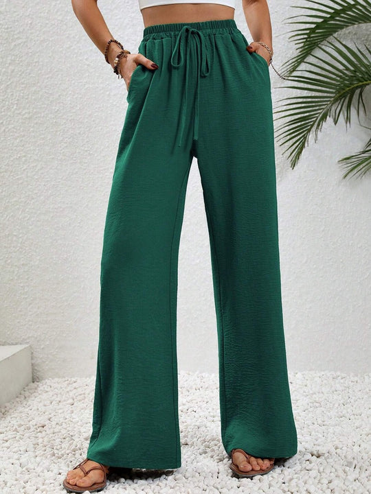 Damen Leichte, weit geschnittene Strandhose mit Elastikbund, Kordelzug und Seitentaschen Shop Nory