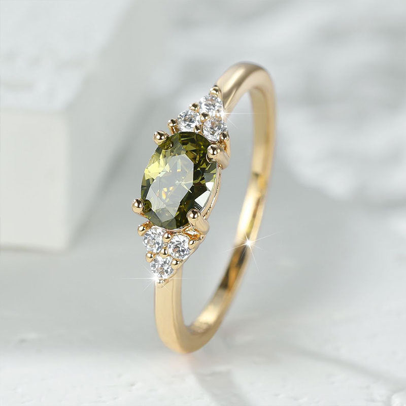 Damen eleganter Ring mit ovaler Edelsteinbesetzung und funkelnden Akzenten Shop Nory