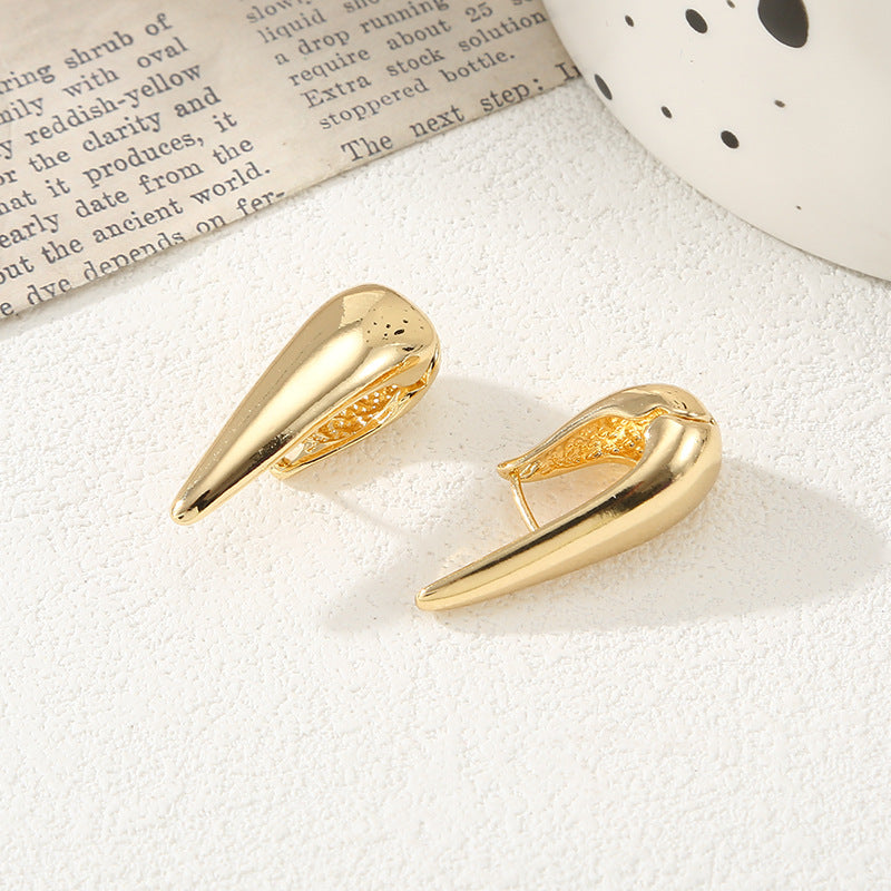 Damen Ohrringe mit elegantem, geschwungenem Design Shop Nory