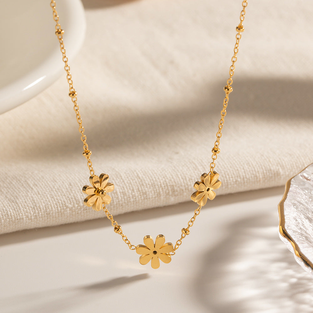 Damen Halskette mit floralen Anhängern und eleganter Gliederstruktur Shop Nory