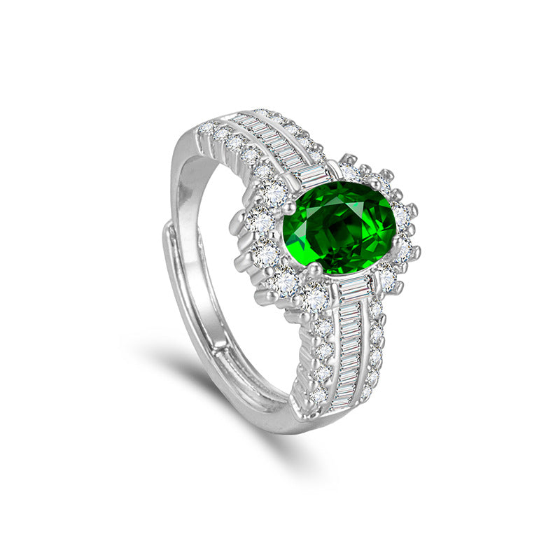 Oval simulierte Edelstein Halo-Verlobungsring mit Mikro Pavé Zirkonia und Baguette-Akzenten