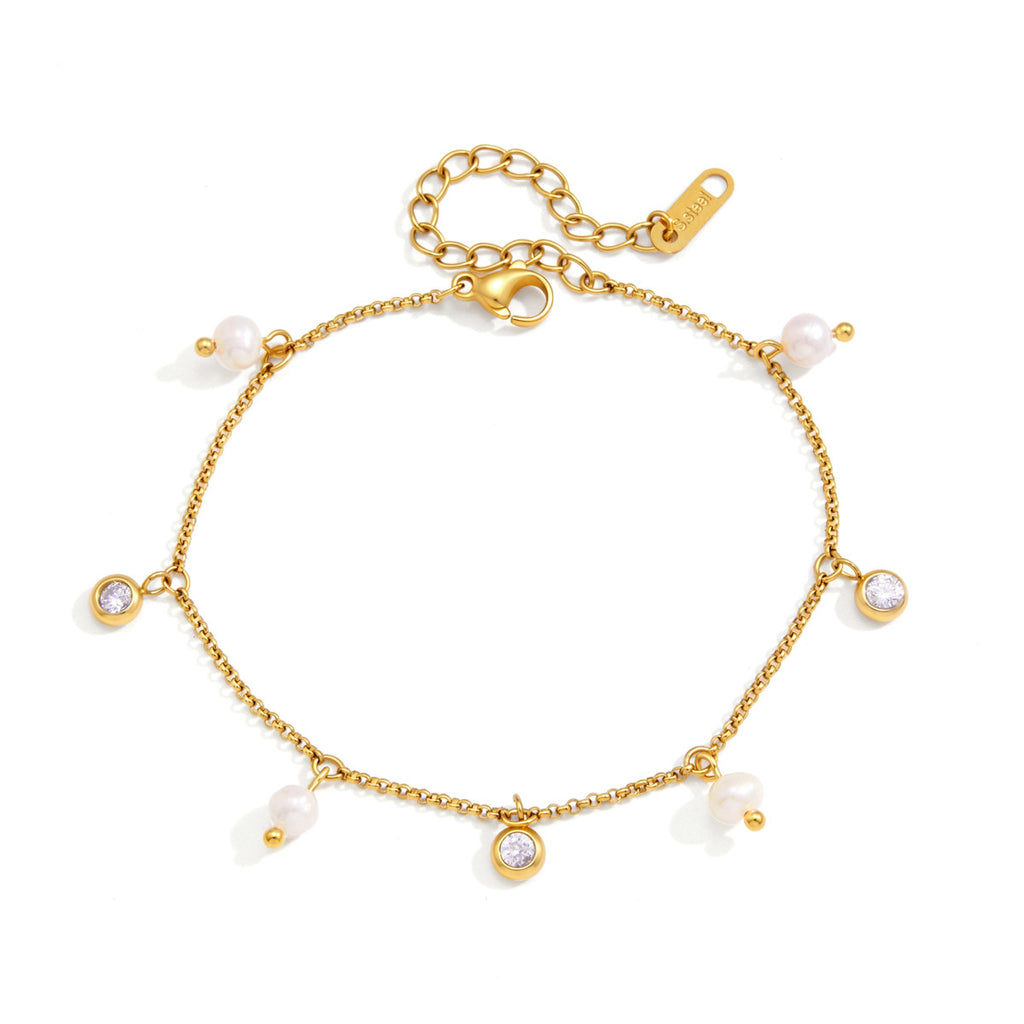Damen Armband mit glänzenden Zirkonia und eleganten Perlendetails Shop Nory